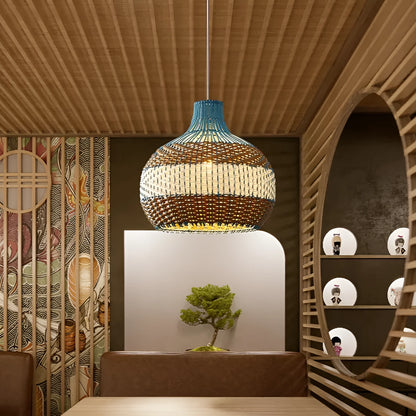 Vine woven rattan Silent Wind style pendant lamp with integrated warm white LED light.