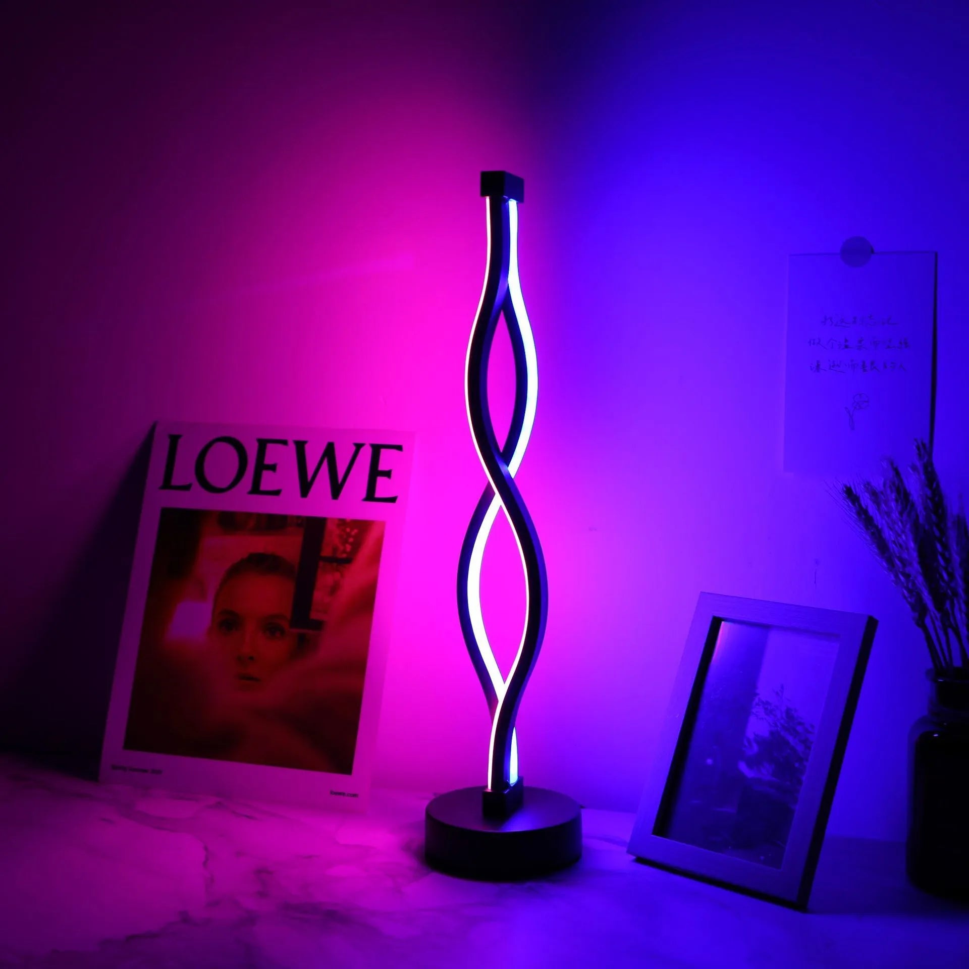 Black aluminium desk lamp with touch dimming and three-colour button controls for bedroom or study