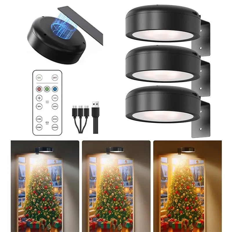 Black magnetic LED painting lamp with remote control on a white wall.