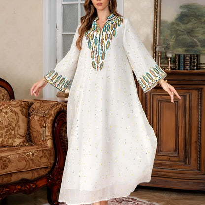 White polyester Arabic robe for women with long sleeves and full-length skirt