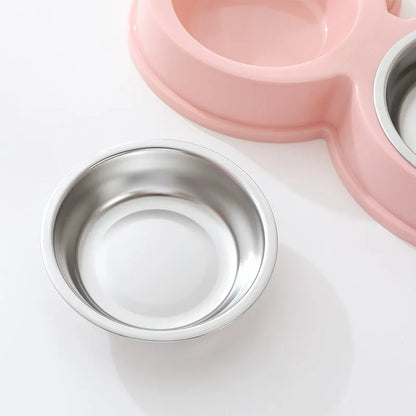 Stainless steel double pet bowl set with frog dish in blue, green, or pink.