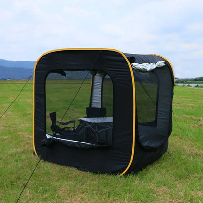 Black pop-up quick-throw car tail tent unfolded to a 200cm cube, set up behind an SUV.