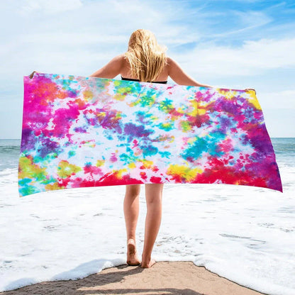 Square beach towel with tie-dye pattern showing superfine fibre texture and vibrant colours