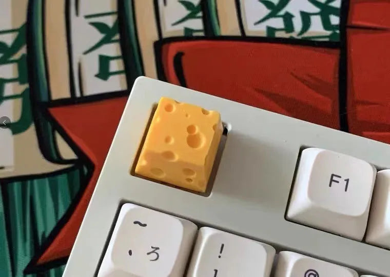 Yellow resin cheese key cap with 3D sculpted design for mechanical keyboards