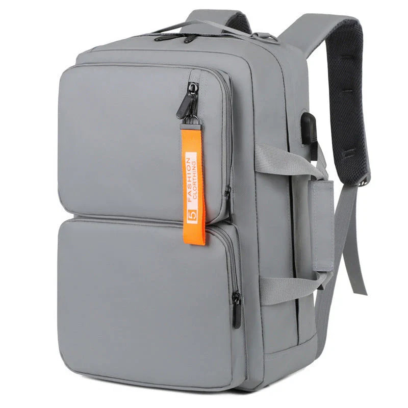 Versatile business laptop backpack with large capacity, USB charging port, and stylish design in gray and black colors