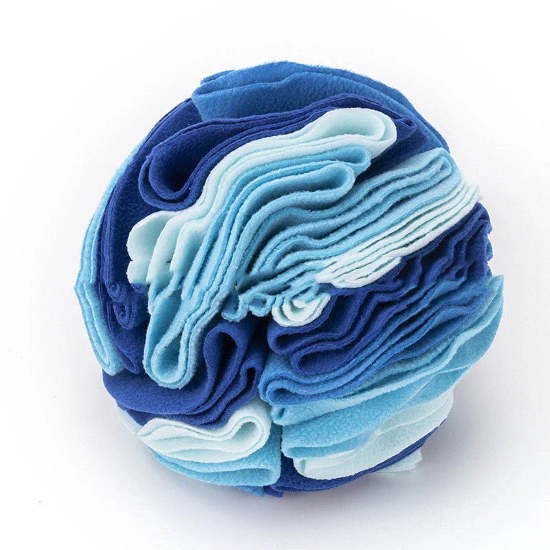 Soft and interactive puzzle ball toy made of polar fleece for dogs and cats to sniff and forage for hidden treats
