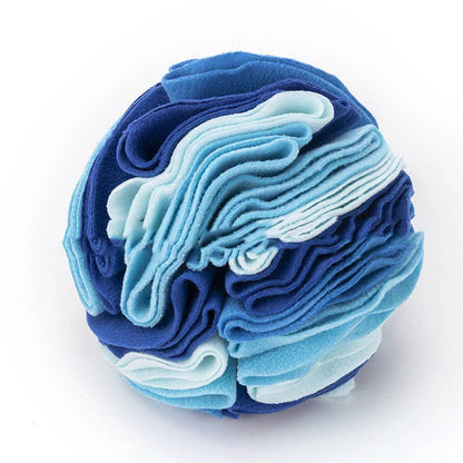 Soft and interactive puzzle ball toy made of polar fleece for dogs and cats to sniff and forage for hidden treats
