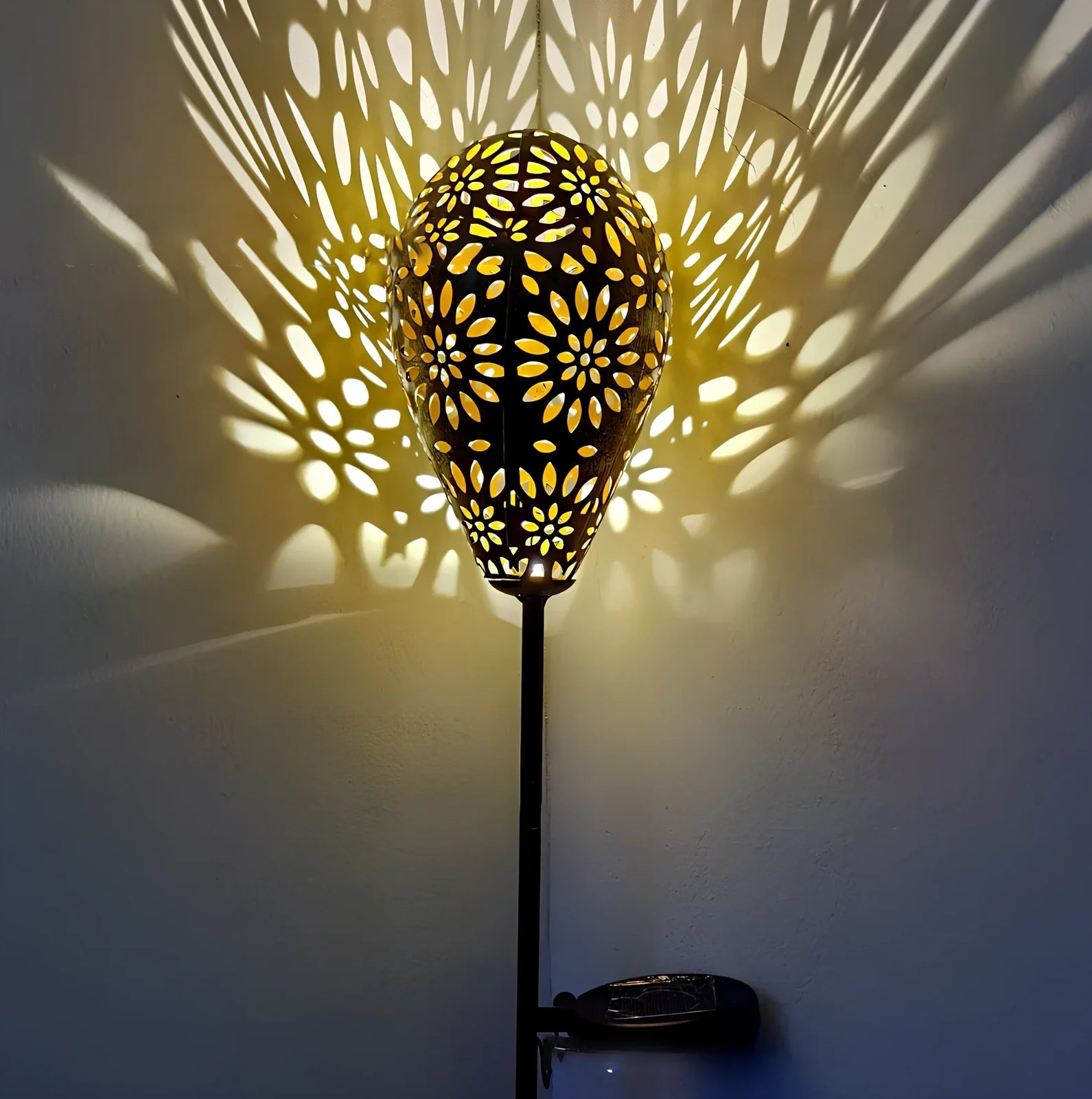 Solar wrought iron ground ball lamp with 15x15x46cm dimensions and LED lighting for garden pathways