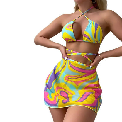 Yellow striped halter neck swimsuit with lace-up front and matching high-waisted skirt and shorts