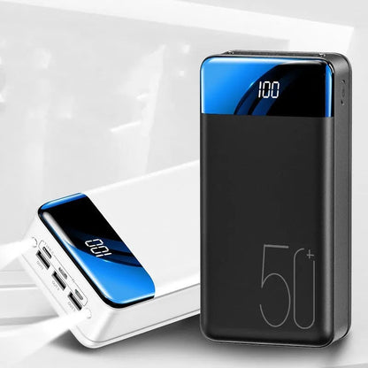 Black or white 50000mAh power bank with three USB output ports, measuring 169x83x52mm