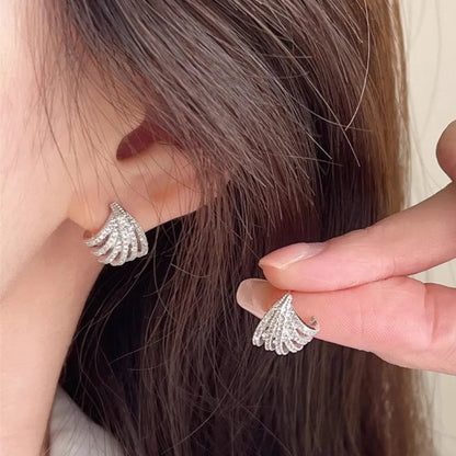 Geometric line design earrings with platinum electroplating on zircon, showing symmetrical patterns and clean architectural lines