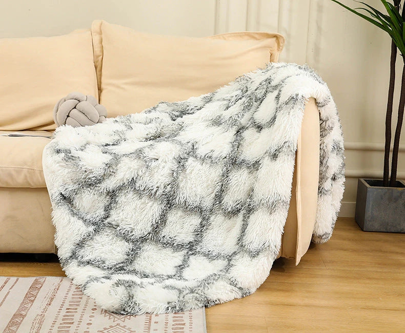 Soft, plush sherpa throw blanket in a variety of colors and sizes, perfect for cozy relaxation on the sofa or bed