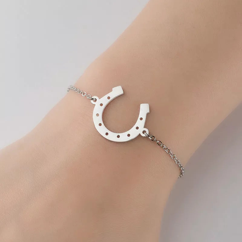 Punk Horse Shoe Chain Bracelet in gold and steel colors, featuring a unique U-shape charm
