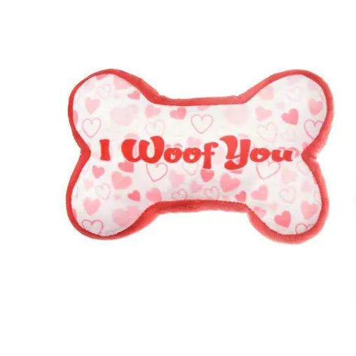Plush pet dental toy in peach heart pink colour with textured surface for tooth cleaning, 15cm length