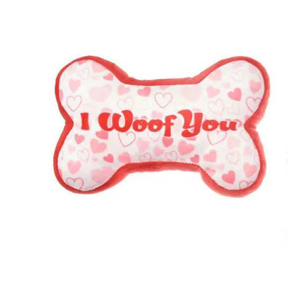 Plush pet dental toy in peach heart pink colour with textured surface for tooth cleaning, 15cm length