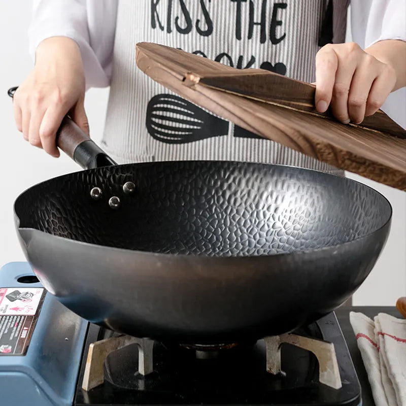 Traditional handmade iron wok pan with wooden handle, 40 cm diameter cooking surface