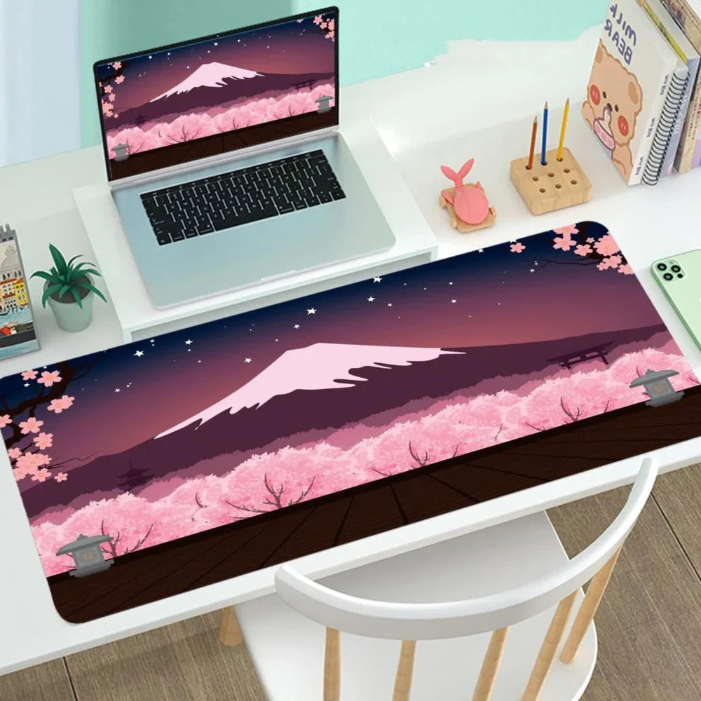 Large gaming mouse mat with printed design on rubber base, multiple size options from 300x600mm to 400x900mm