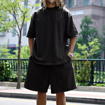 Men's loose sports set with round neck T-shirt and drawstring shorts in various colors