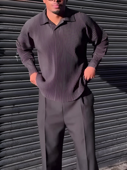 Man wearing a black pleated long-sleeve casual polyester top