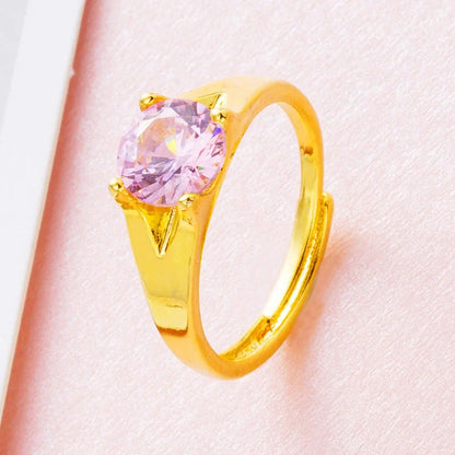 Women's adjustable copper ring with Vietnam placer gold zircon stones in six colour options showing adjustable opening mechanism