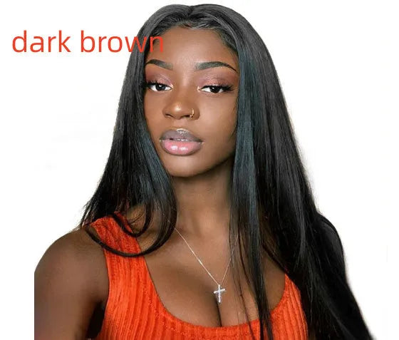 Long black straight synthetic wig on a stand, showing centre parting and full fringe