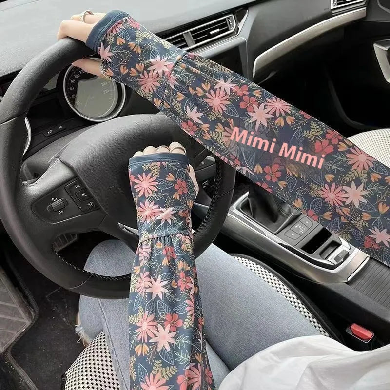 UV protection ice silk oversleeves in floral pattern covering forearm and elbow