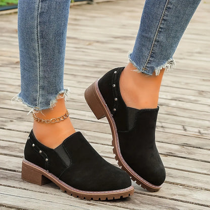 Light brown plus size women's suede ankle boots with a thick low heel and elastic band side closure.