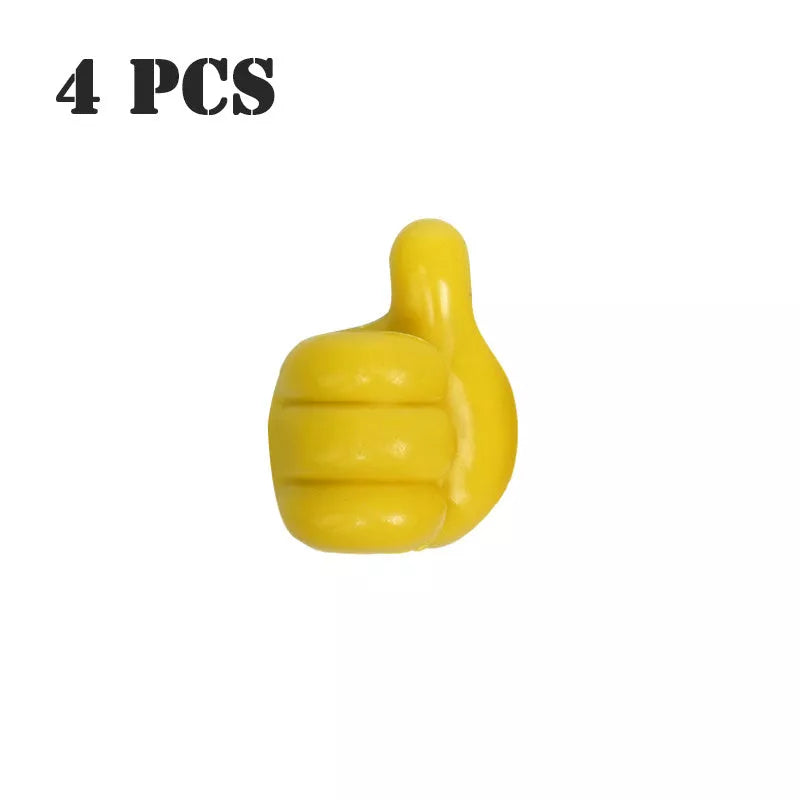 Silicone thumb wall hooks in various colors for organizing kitchen and bathroom items