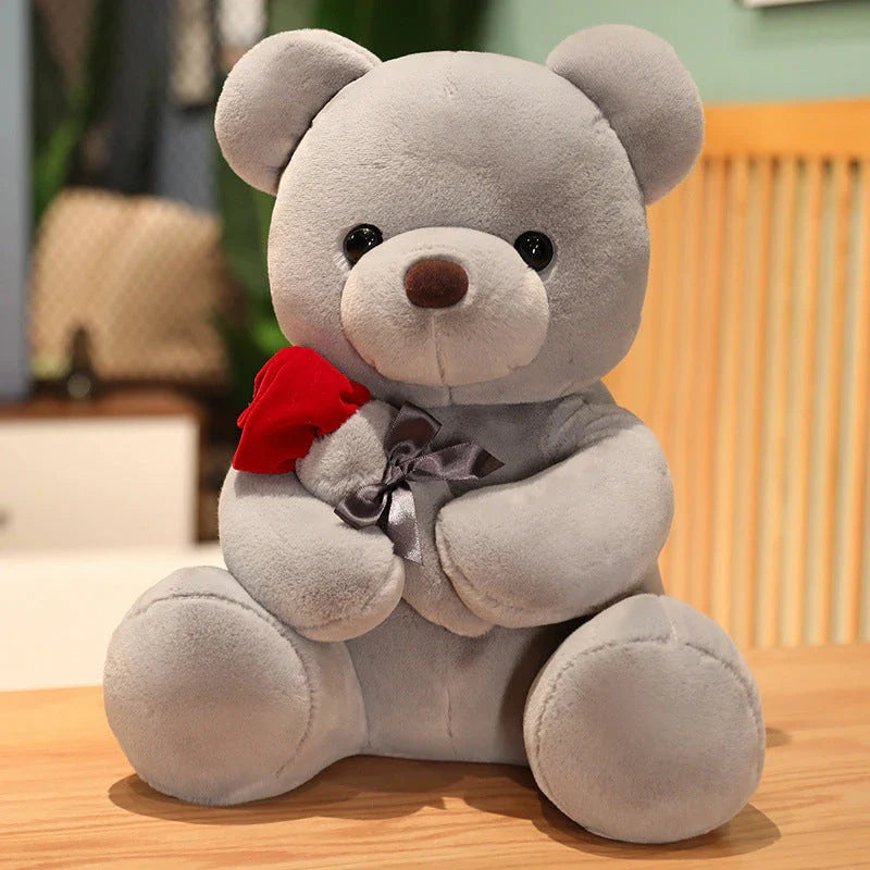 Soft, plush teddy bear-shaped pillow in brown, beige, and grey colors, perfect for cuddling and relaxation