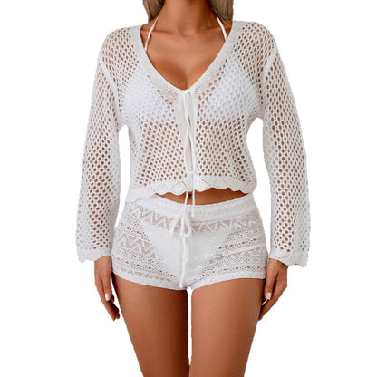 Women's hollow woven cardigan blouse with bell sleeves in apricot colour, showing textured fabric and nine-quarter sleeve length