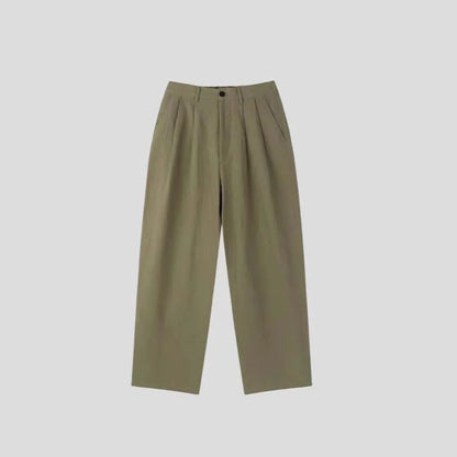 Men's apricot cotton linen trousers with elastic waistband and pencil leg opening on hanger