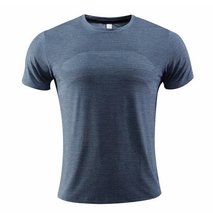 Close-up of a red polyester-spandex sports t-shirt on a hanger, showing the short sleeve and fabric texture.