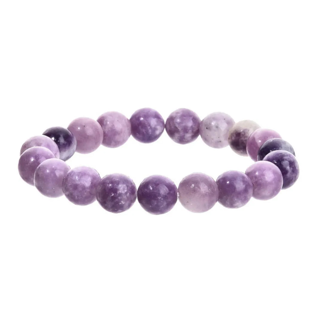Purple geometric stone bead bracelet on an elastic band, showing manual craftsmanship.