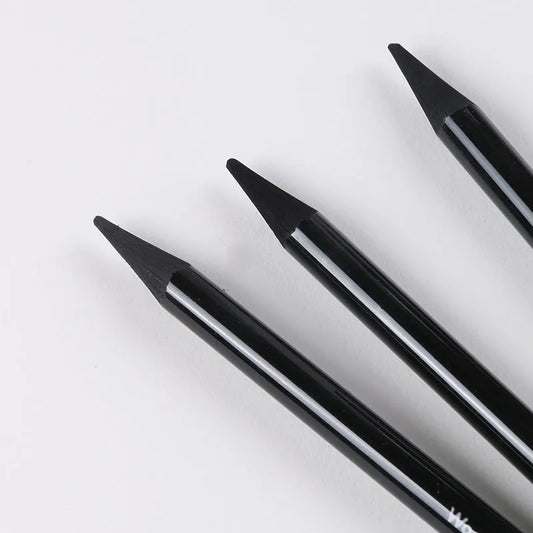 Carbonized Pencil Suit with six graphite and three carbonized pencils on suction card packaging