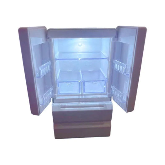 White plastic miniature candy toy model with light-up feature, dimensions 11.4cm height, 5.8cm length, 5cm width