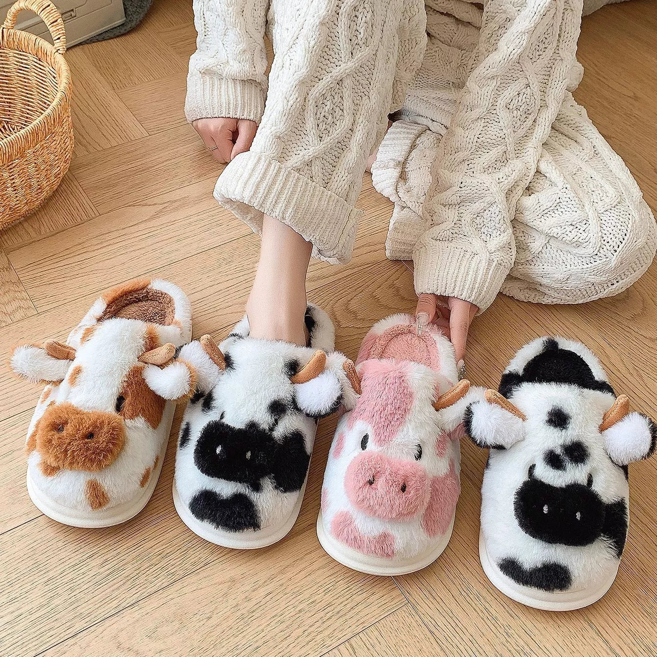 Cartoon cow plush slippers in black, leather red, and brown with non-slip soles
