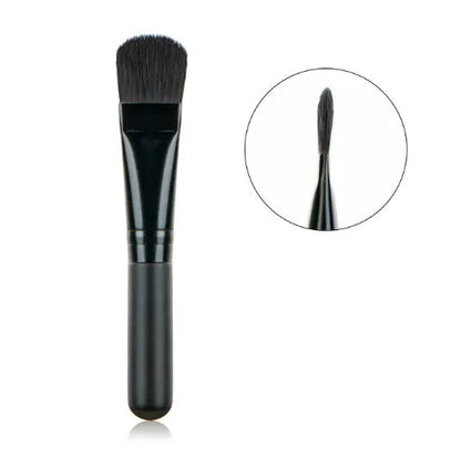 Wooden handle facial treatment brush, 12cm total length, 2cm artificial fibre bristles, black or wood colour.