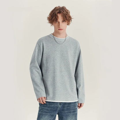 Men's loose fit long-sleeved cotton blend t-shirt in solid colour on hanger