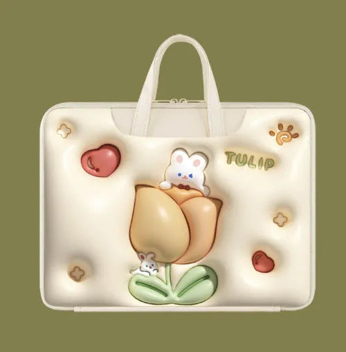 PU leather inflatable laptop bag with strap, shown in a cartoon pattern design, hanging from a suitcase handle.