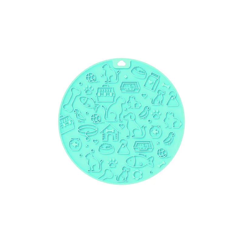 Round blue silicone pet licking mat with textured surface and suction base for slow feeding