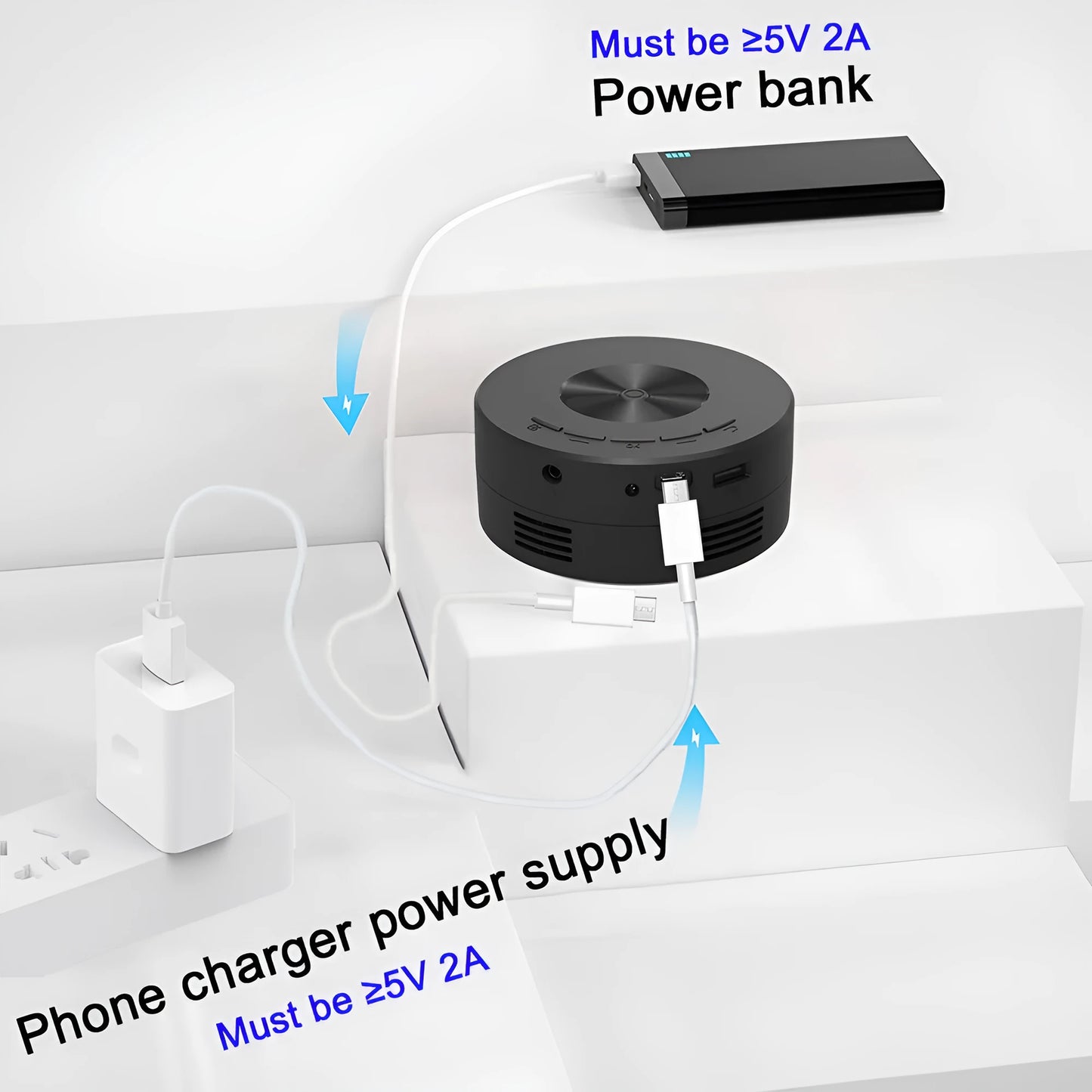 Black children's portable projector for mobile phones measuring 110x110x47mm with plug-in power cable