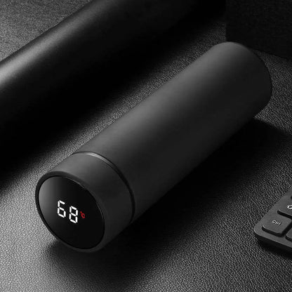 Stainless steel water bottle with double-wall vacuum insulation, shown in black, red, gold, and blue colour options.
