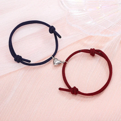 Fashionable magnetic couple bracelets with heart-shaped charms in various color options