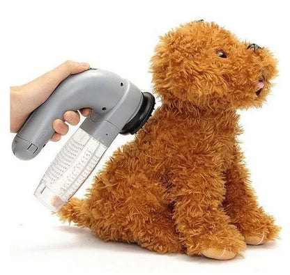 Grey portable pet hair vacuum cleaner with soft rubber head for grooming cats and dogs.