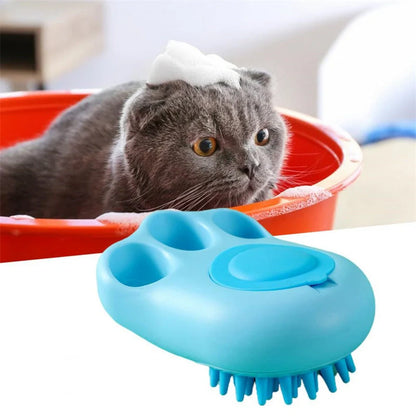 Claw-shaped pet grooming brush in pink, blue, yellow, and grey