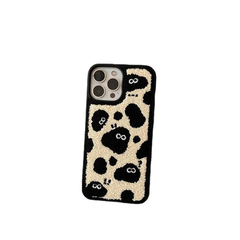 Black plush fairy character back cover case for Apple iPhone mobile phone.