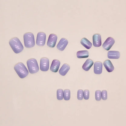 Short aurora fake nails with bright starry sky glitter pattern, 24-piece set with adhesive glue