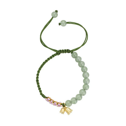 Hand woven red rope women's bracelet in Lily Carrying Strap colour with a flower element.