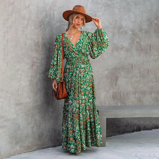 A green halter dress with a vibrant printed pattern and lantern sleeves.