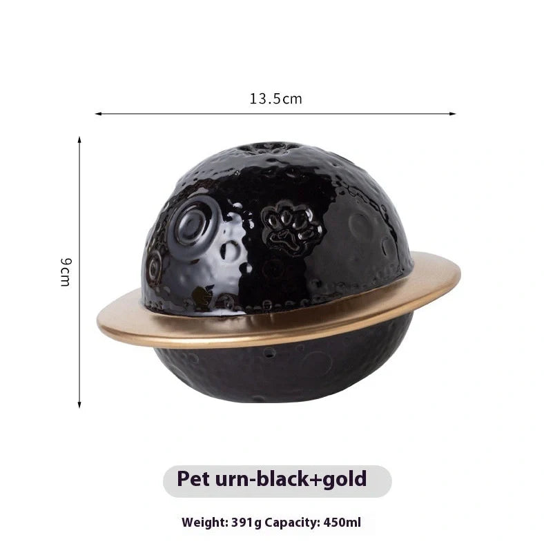 Handmade ceramic cinerary casket with cosmic starry sky design and cat-dog motifs in multiple colours